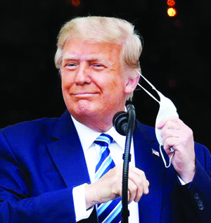 trump-takes-off-mask-111020-01