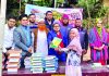 লিটল ফ্লাওয়ার কিন্ডারগার্টেন এন্ড হাইস্কুলে বই বিতরণ