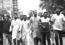 চাঁদাবাজি বন্ধে শ্রমিক কল্যাণ ফেডারেশনের বিক্ষোভ মিছিল