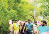 ত্রাণের বস্তা কাঁধে নিয়ে দুর্গতদের কাছে পৌঁছে দিলেন নাহিদ ও হাসনাত