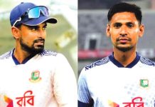 মাইল ফলকের সামনে লিটন-মোস্তাফিজ